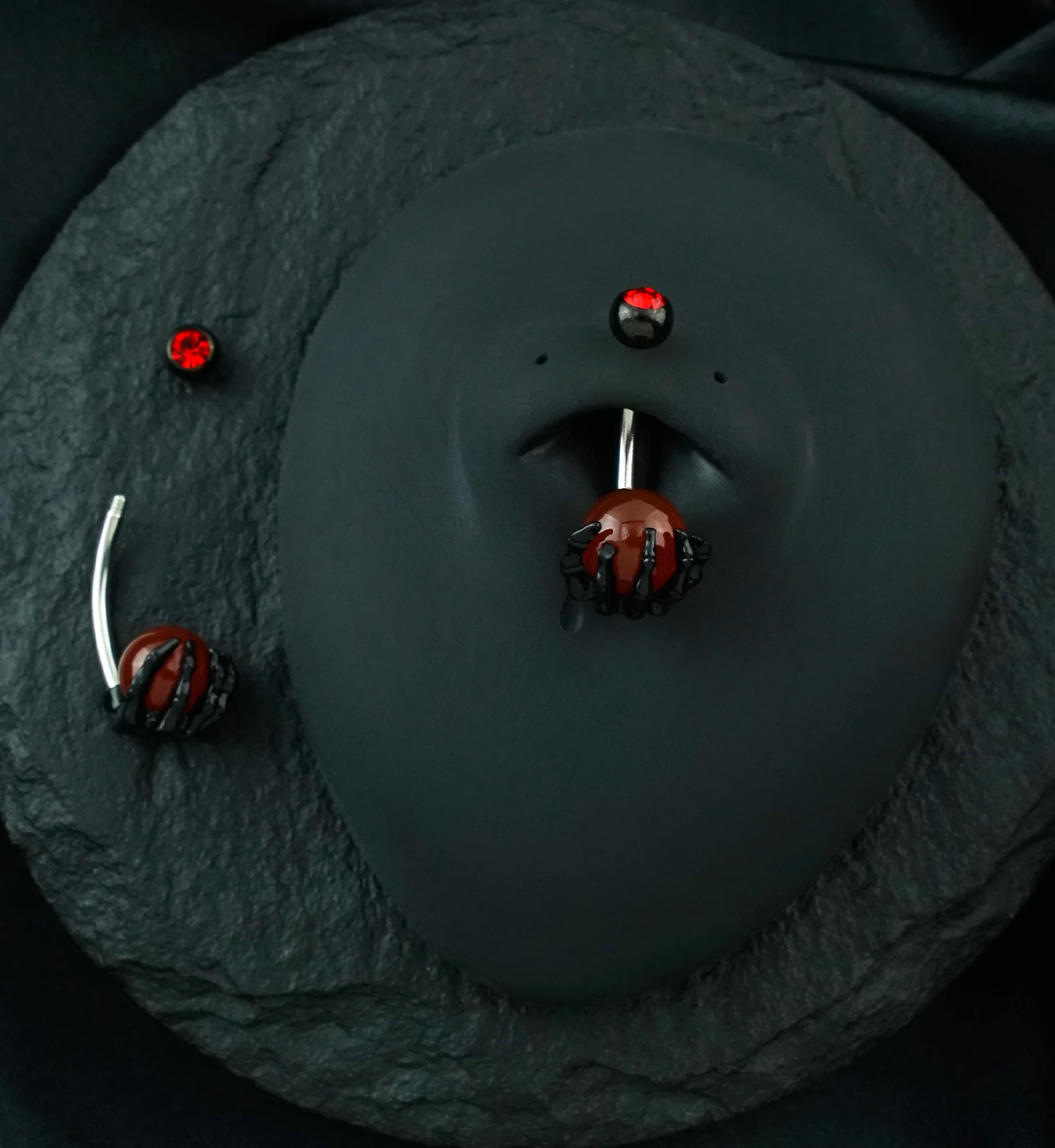 Black PVD Skeletal Palm Red Agate Belly Button Ring - Image 2