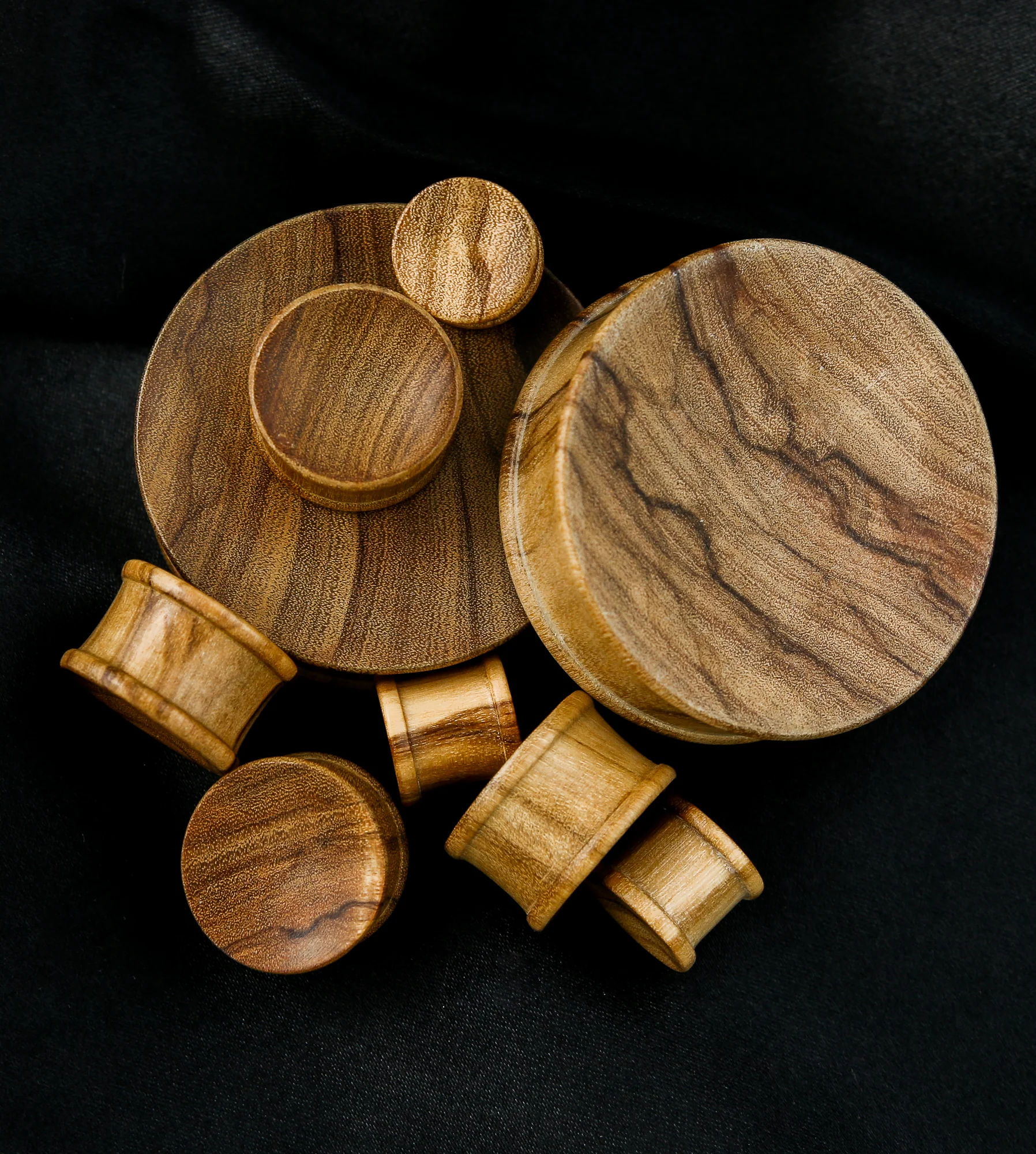 Olive Wood Concave Top Hat Plugs - Image 2