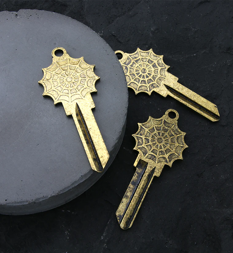 Spiderweb Brass Key - Image 2
